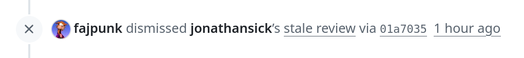 Screenshot showing a GitHub PR message stating that a stale review has been dismissed.